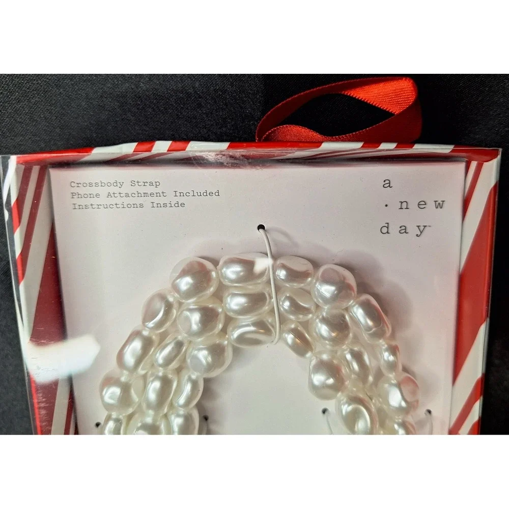 A New Day beaded crossbody strap and 3 beaded phone wristlets (gone tone clasps)